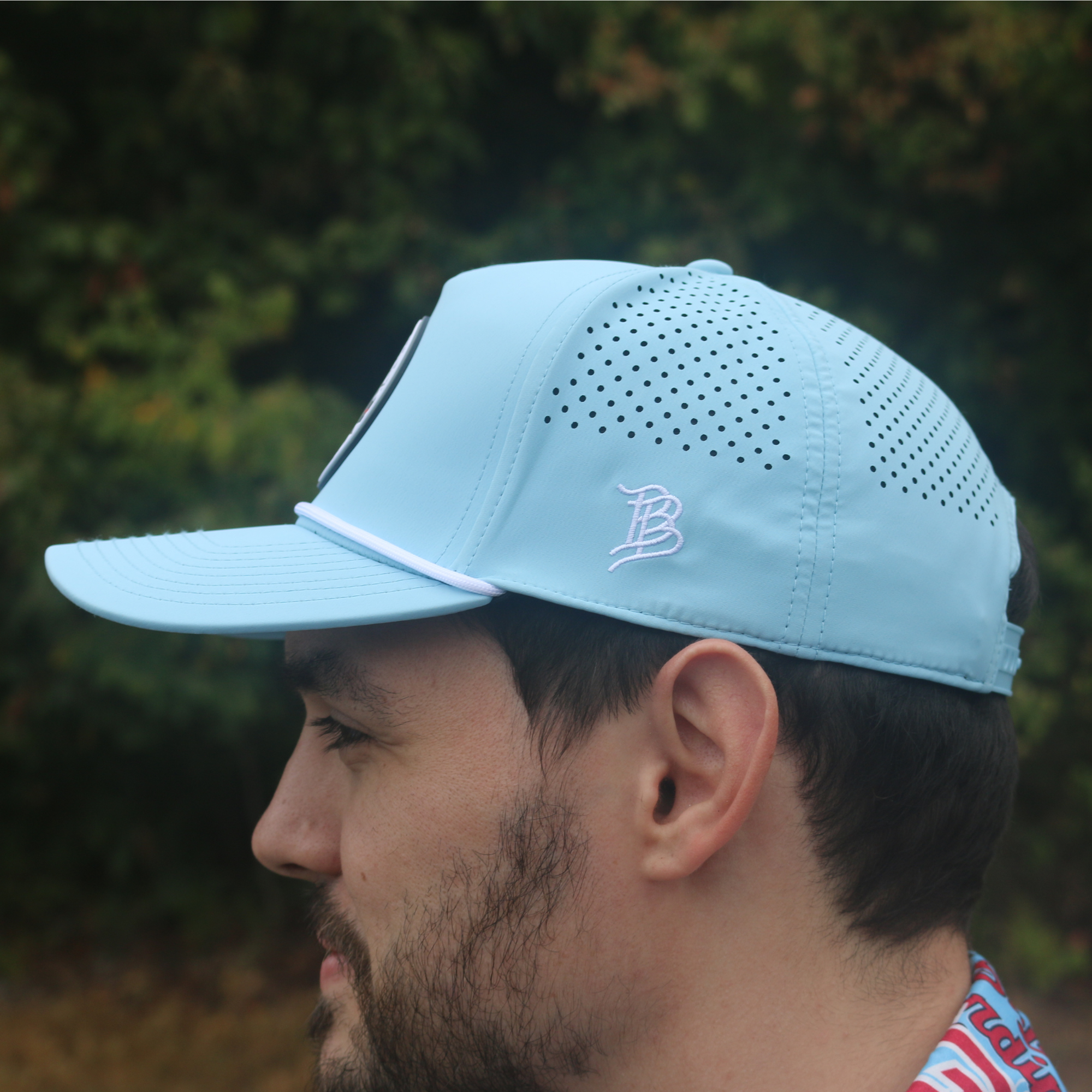 Branded Bills Performance Hat – Light Blue Badge